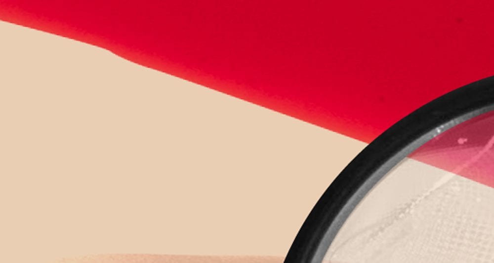 bright red period blood on a pink background
