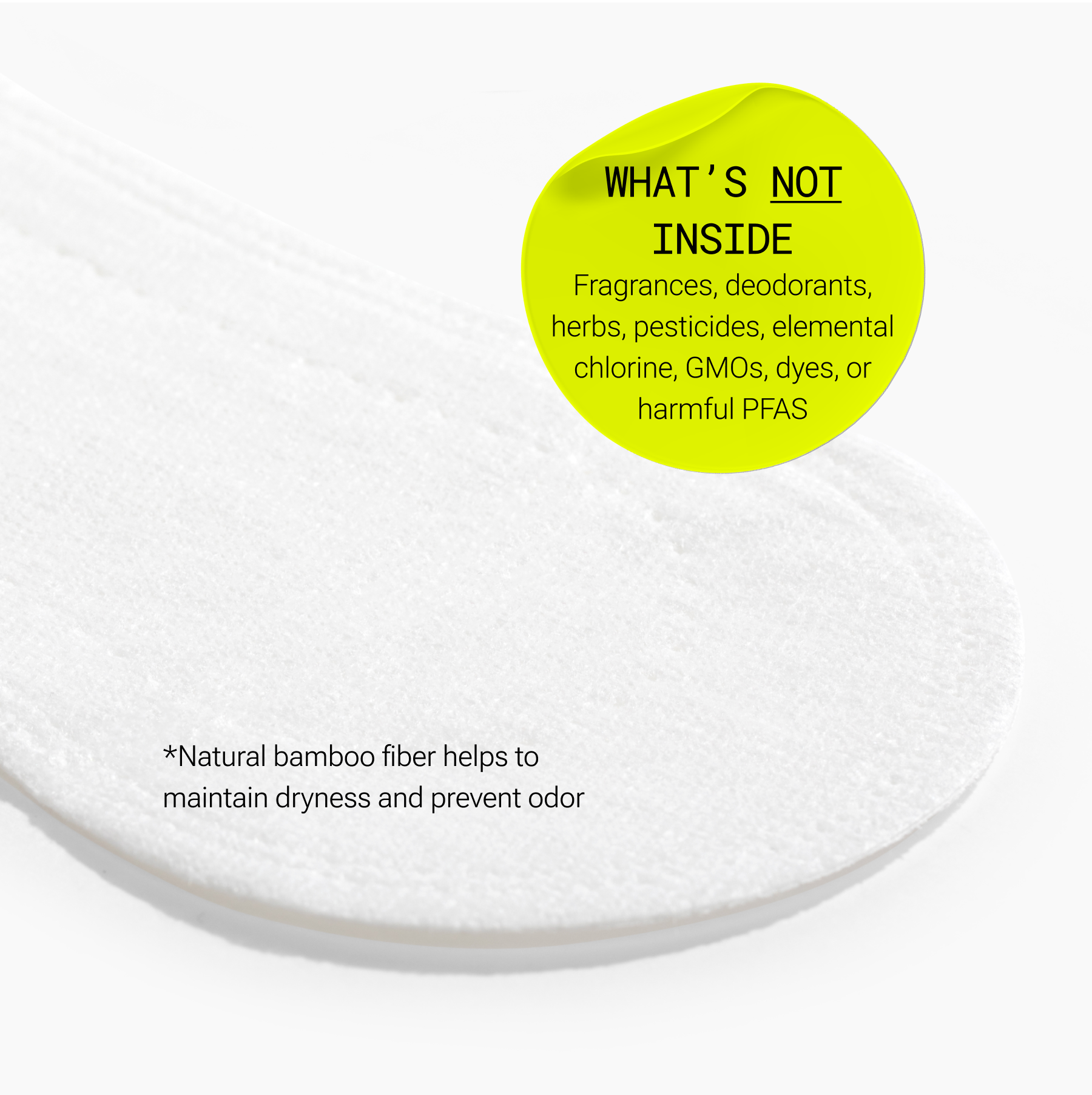 Close-up of a menstrual liner with text indicating absence of certain chemicals and use of bamboo fiber.